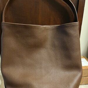 Large pebbled leather bucket bag.